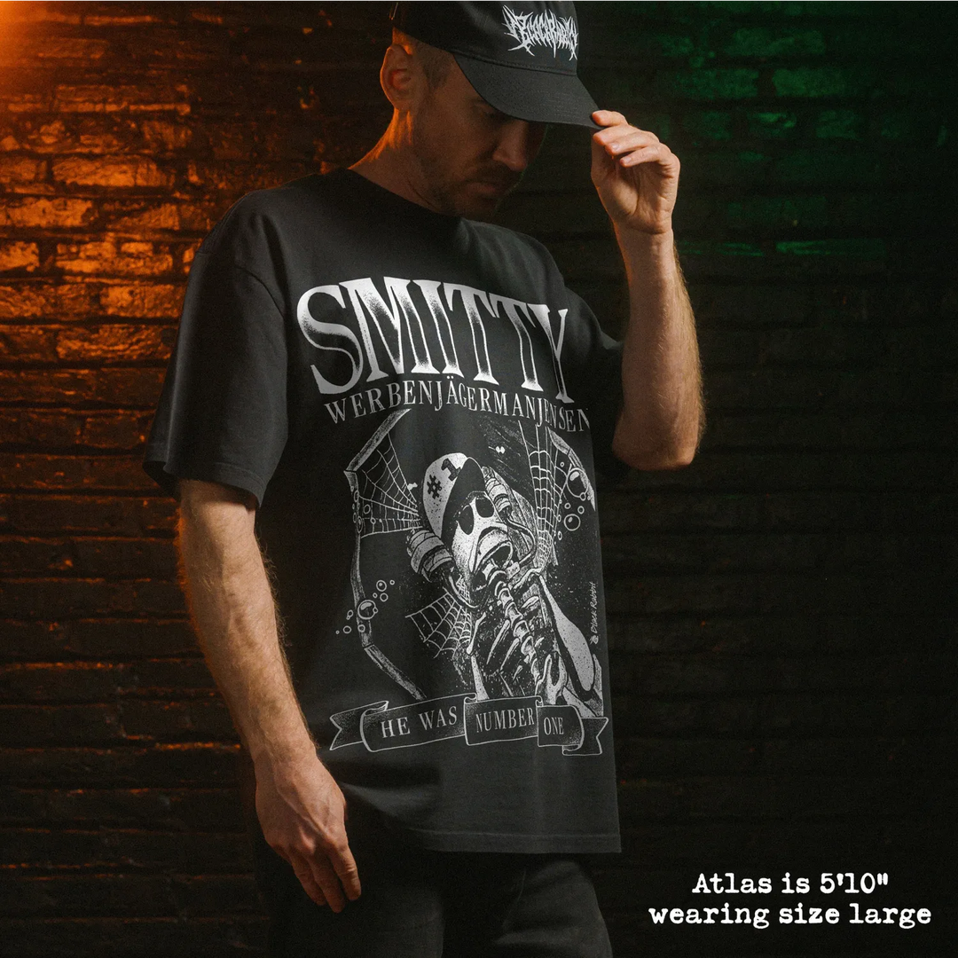Model wearing heavy tee with smitty graphic 