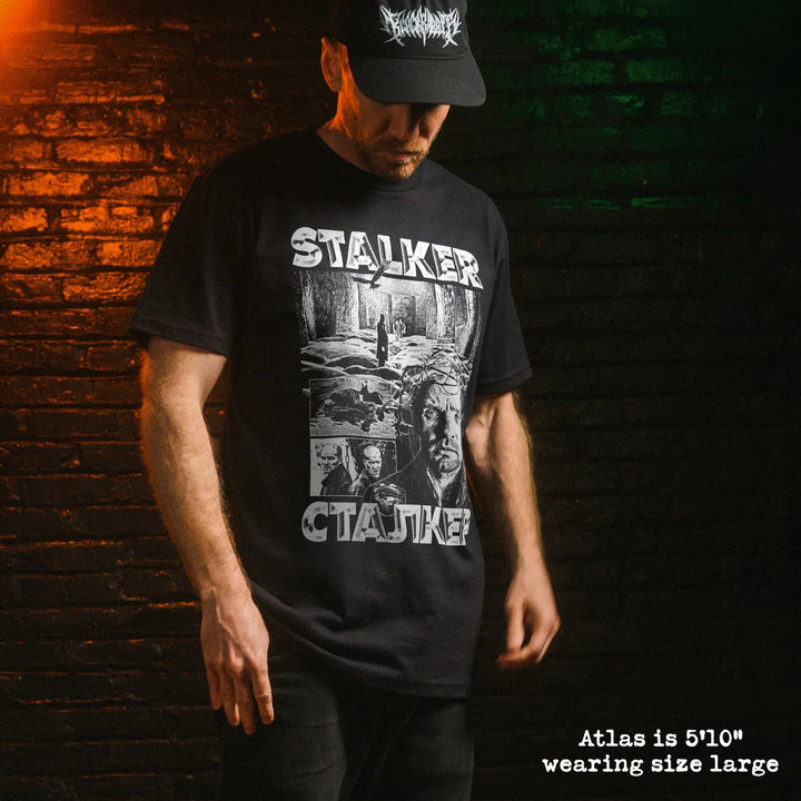 Male model wear soft premium tee with stalker graphic
