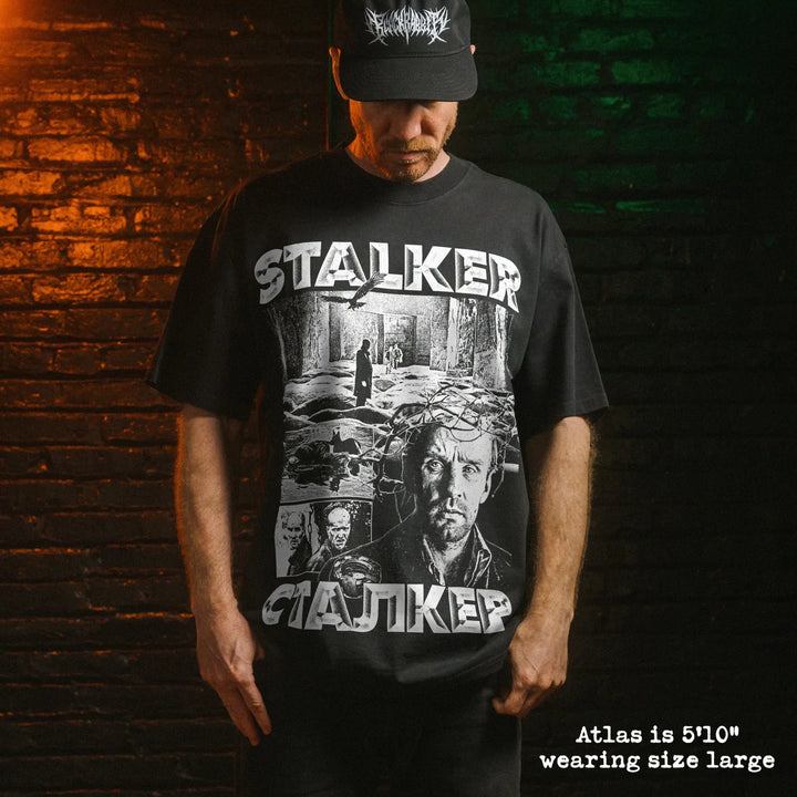 Model wearing heavy tee with stalker graphic 