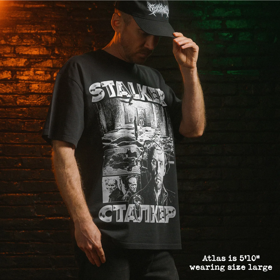 Model wearing heavy tee with stalker graphic 