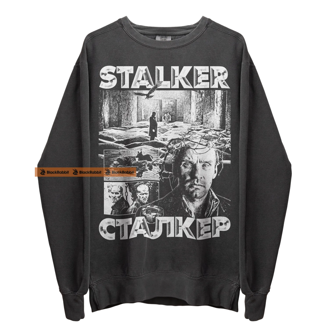 Gray sweatshirt with ’Stalker’ graphic.