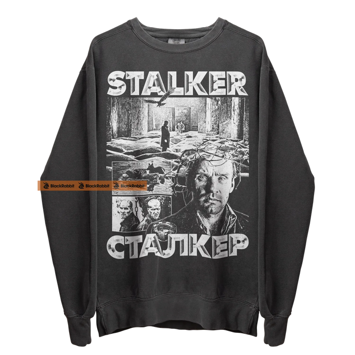 Gray sweatshirt with ’Stalker’ graphic.