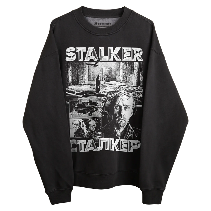 Black long-sleeved sweatshirt with ’stalker’ graphic design featuring multiple scenes and characters from the film.