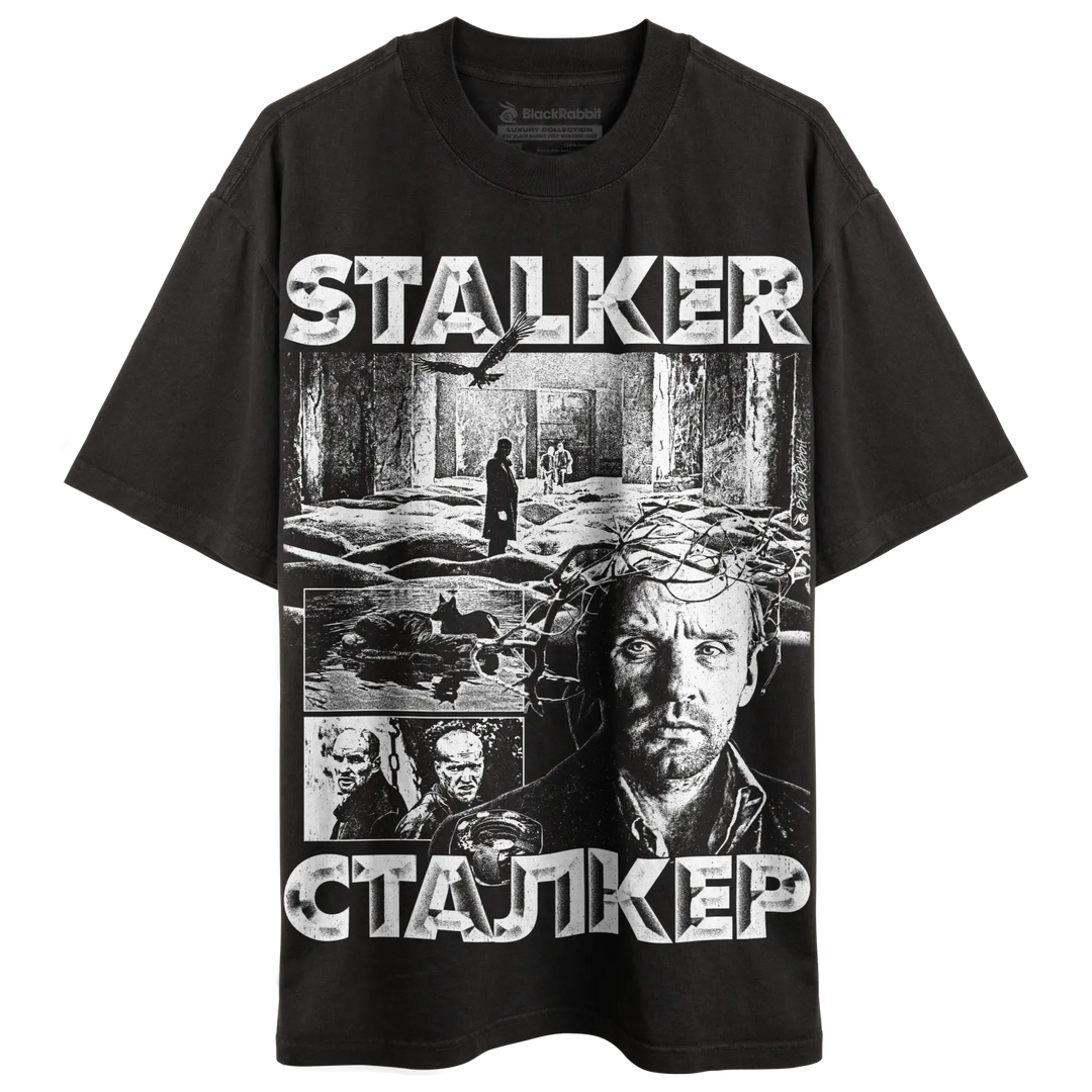 Black t-shirt with a monochrome graphic print featuring scenes and characters from the film ’Stalker.’