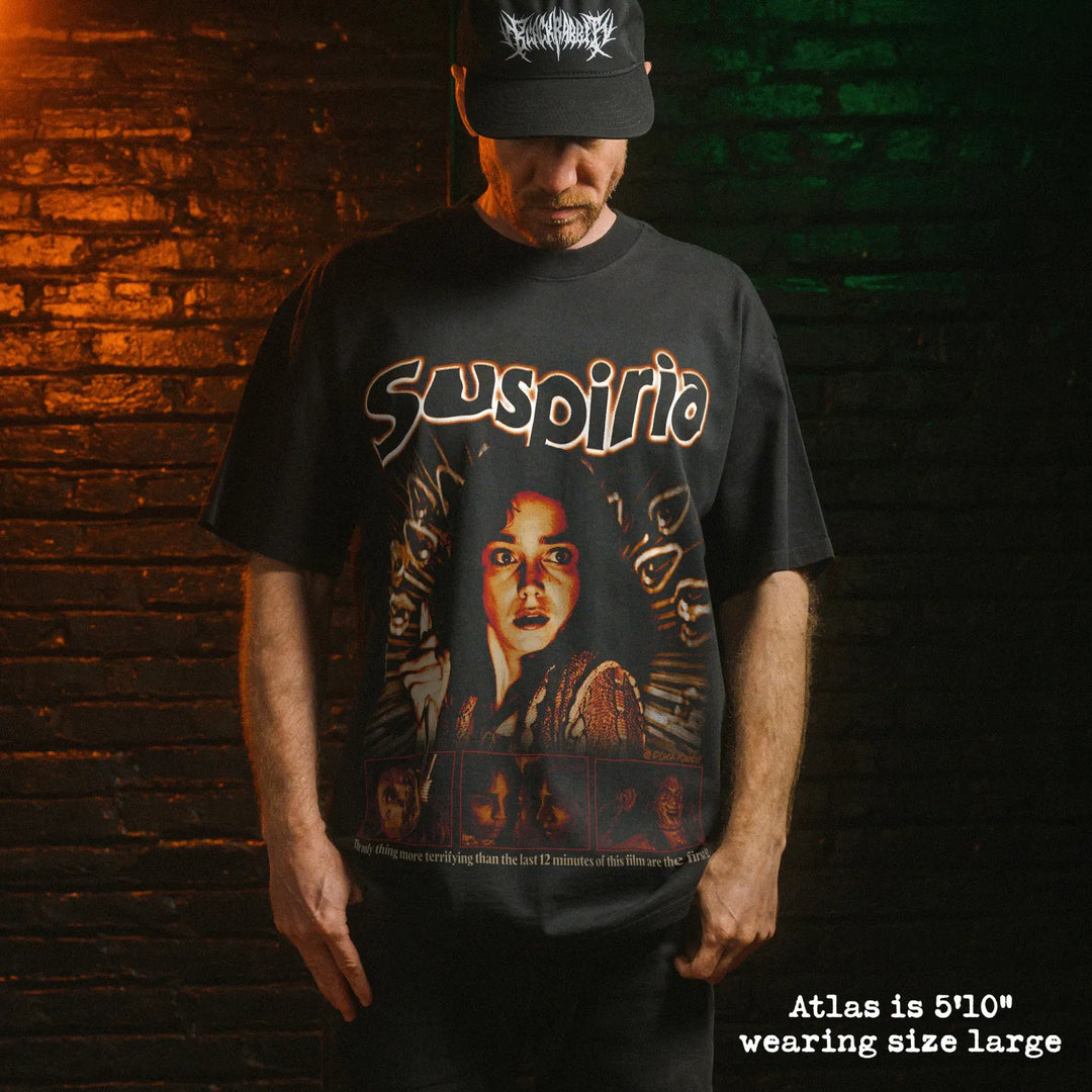 Model wearing heavy tee with suspiria graphic 