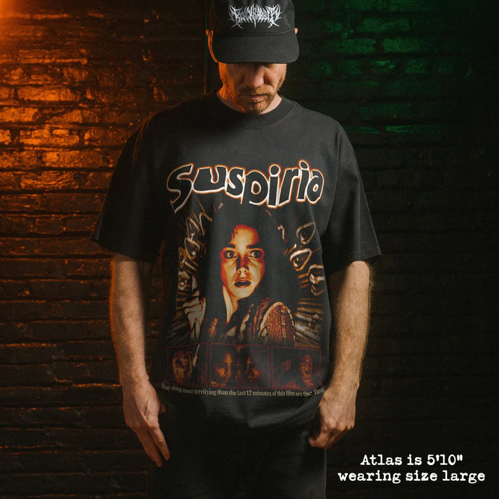 Model wearing heavy tee with suspiria graphic 