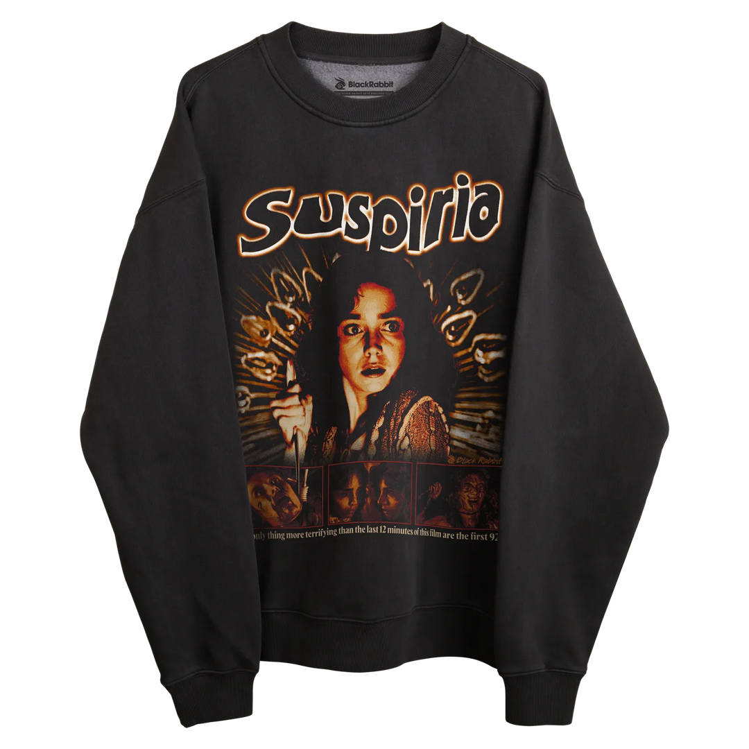 Black ’suspiria’ sweatshirt with snake design and text.