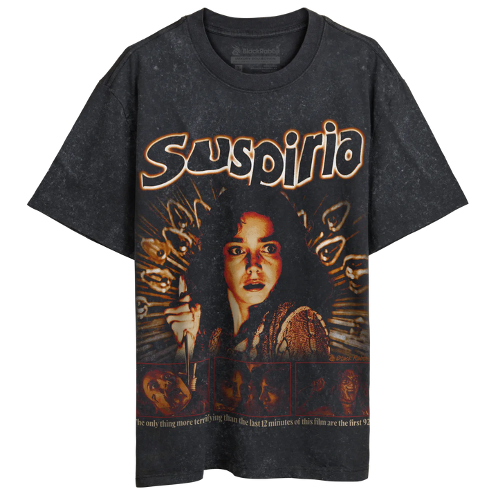 Distressed black t-shirt featuring a ’Suspiria’ graphic and a frightened woman’s face.