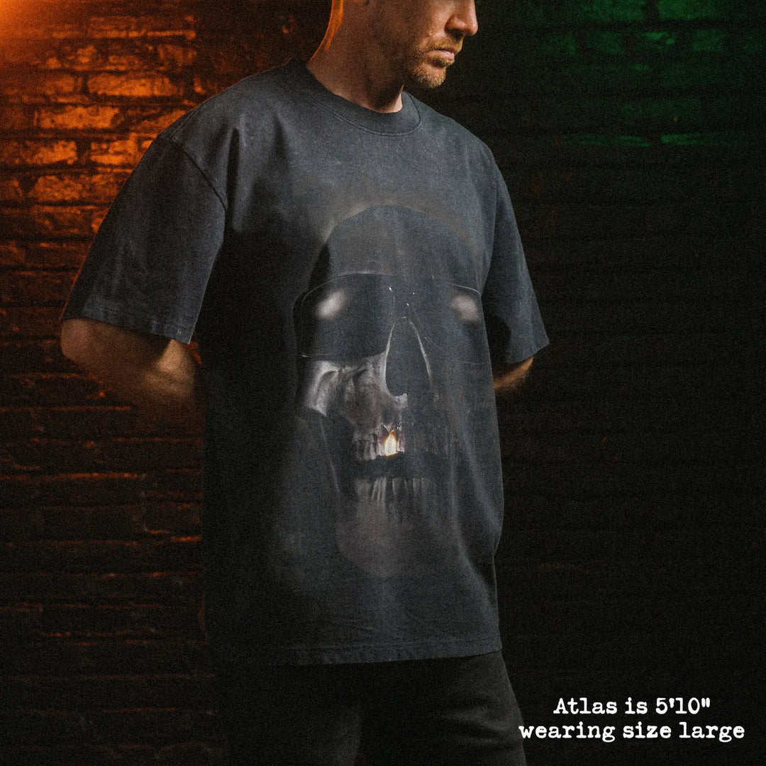 Male model wearing stone wash heavy tee with tales from the hood graphic 