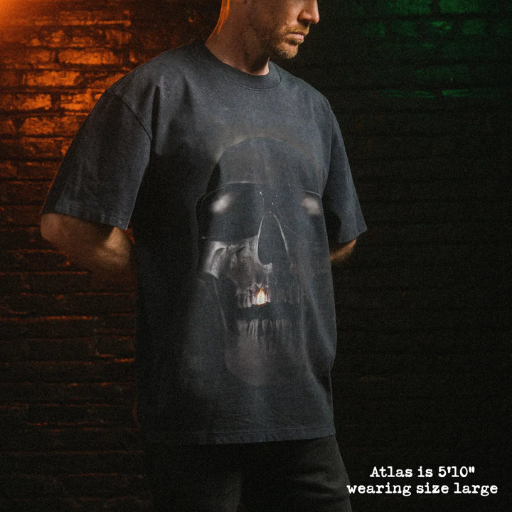 Male model wearing stone wash heavy tee with tales from the hood graphic 