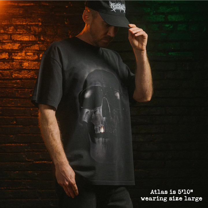 Model wearing heavy tee with tales from the hood graphic 