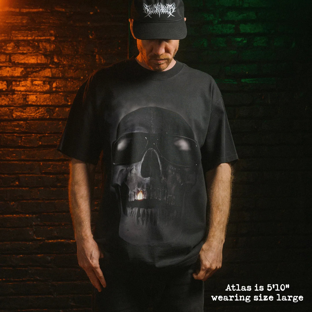 Model wearing heavy tee with tales from the hood graphic 