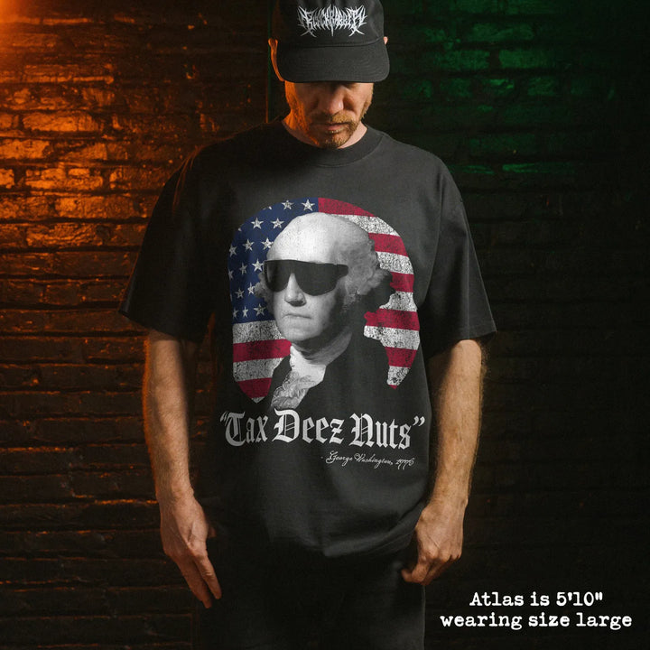 Model wearing heavy tee with tax deez nuts graphic 