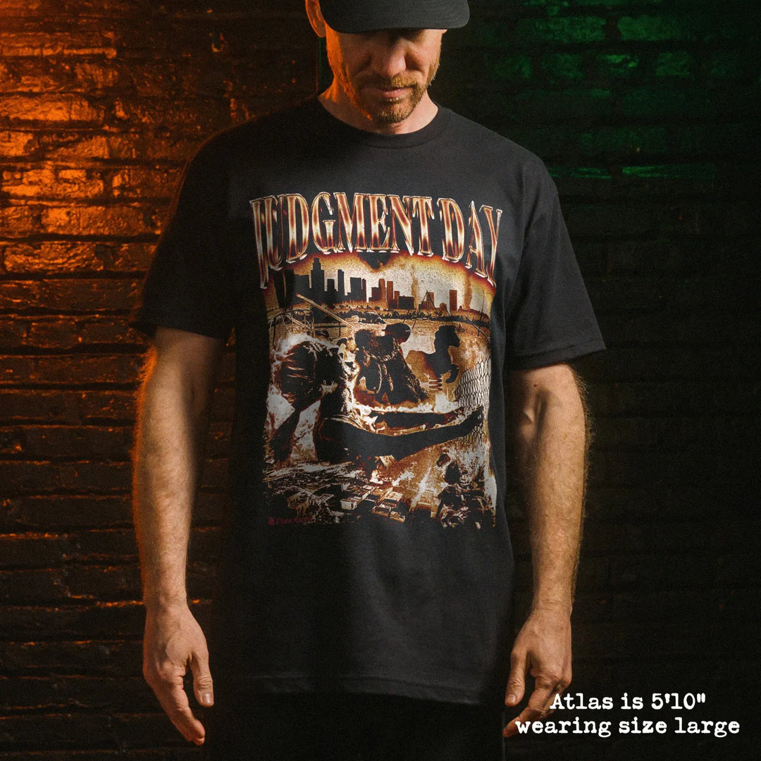 Male model wear soft premium tee with judgment day graphic
