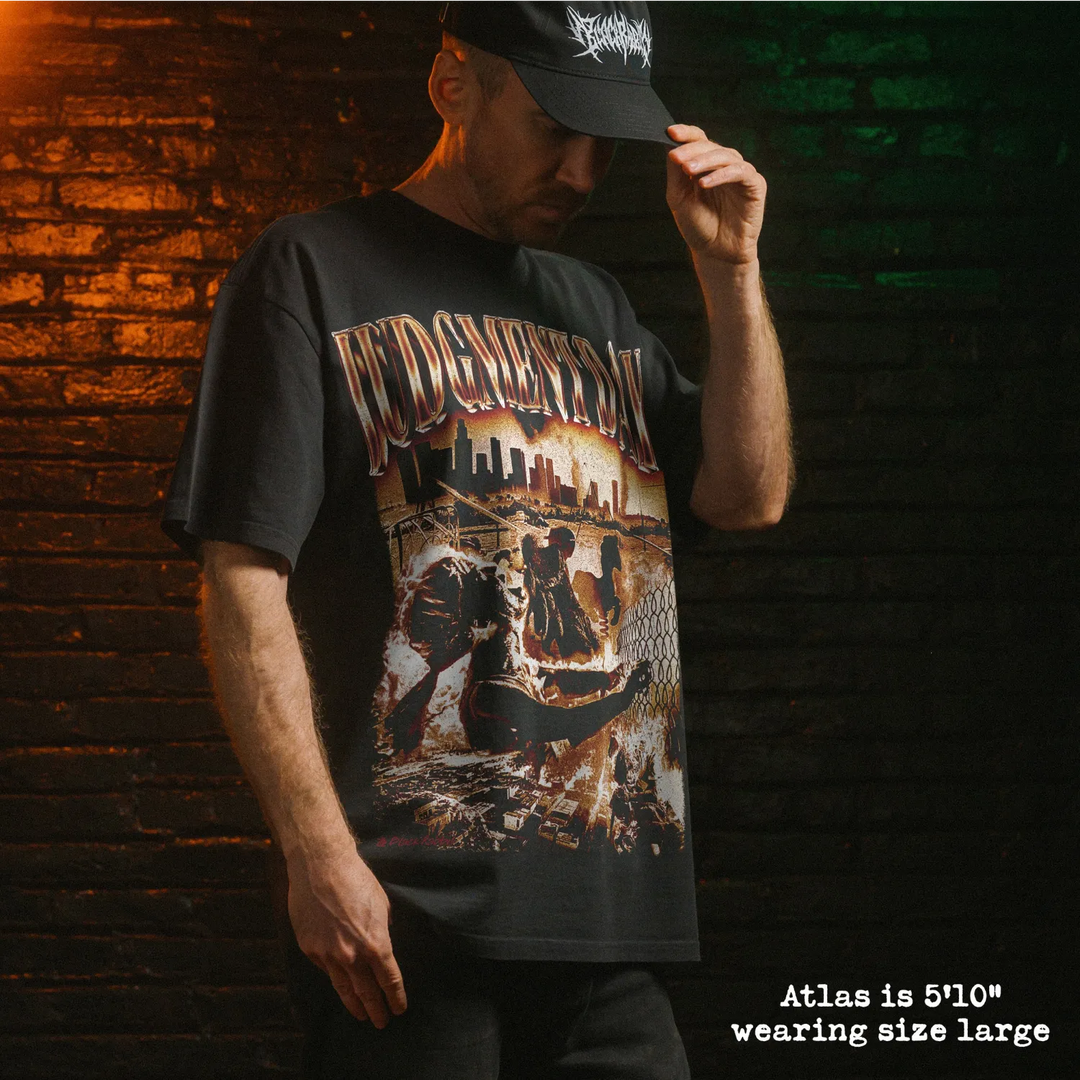 Model wearing heavy tee with judgment day graphic 