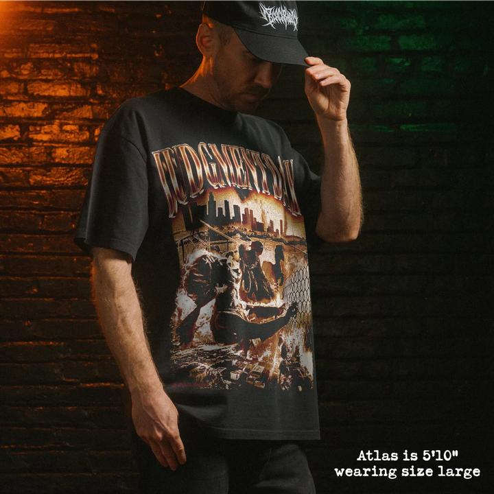 Model wearing heavy tee with judgment day graphic 