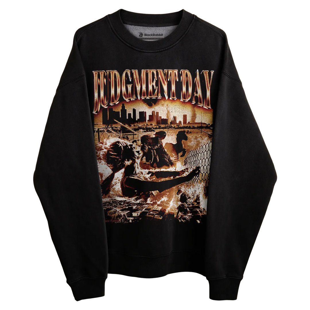 Black sweatshirt with ’judgment day’ graphic design featuring a cityscape and figures, likely made of cotton or polyester blend.