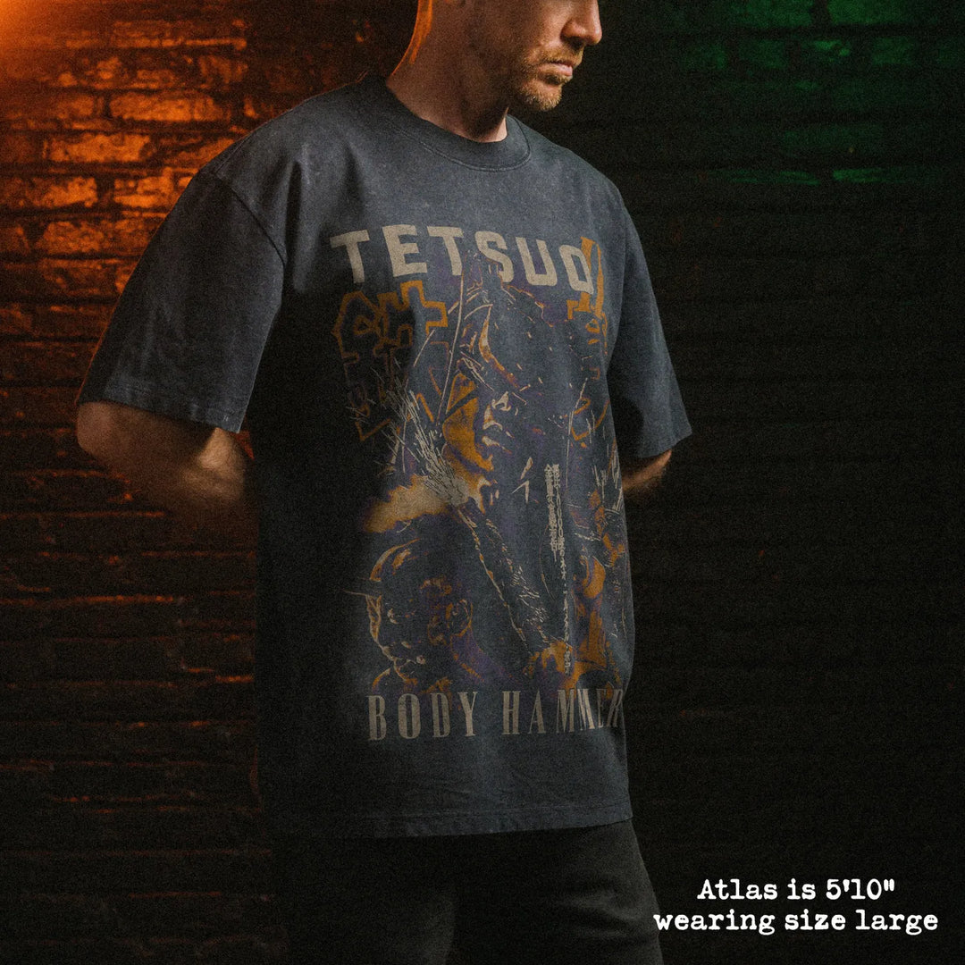 Male model wearing stone wash heavy tee with tetsuo II graphic 