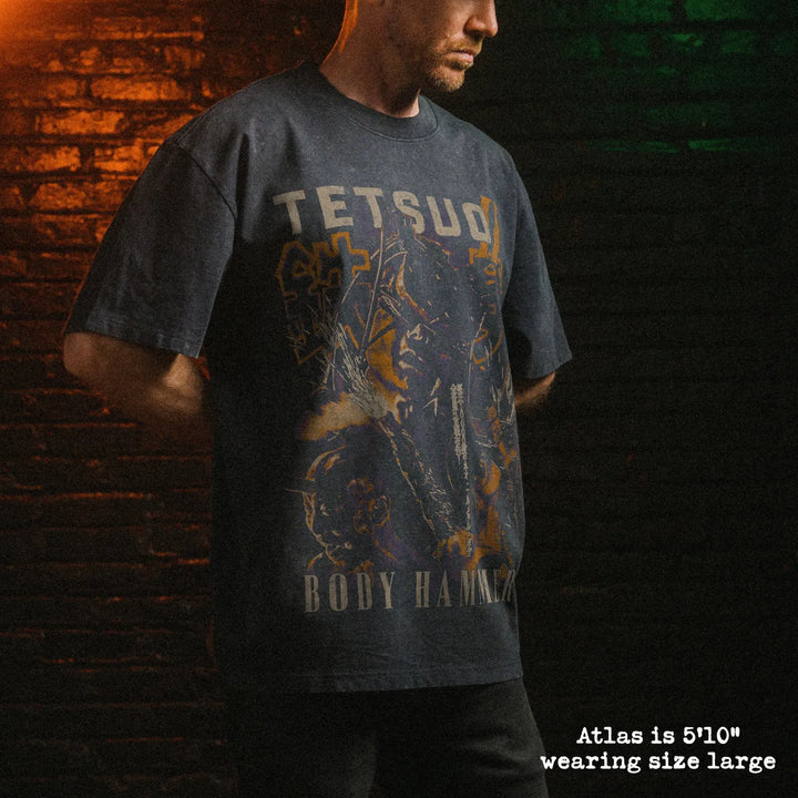 Male model wearing stone wash heavy tee with tetsuo II graphic 