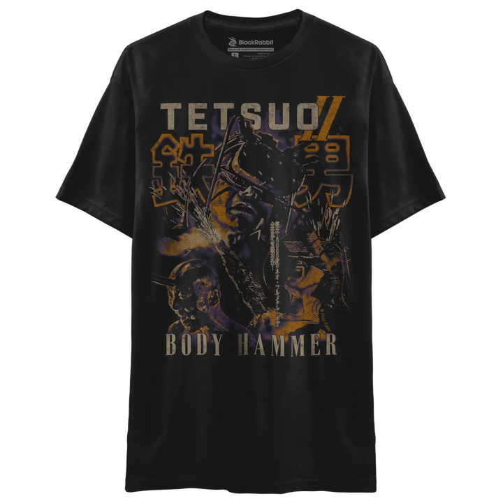 Black t-shirt featuring a graphic print with the text ’tetsuo’ and ’body hammer,’ along with stylized japanese characters, in shades of orange, yellow, purple, and black. 
