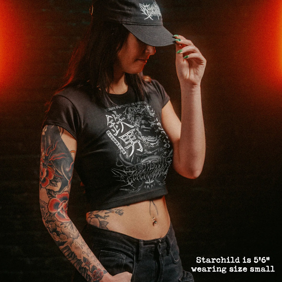 Female model wearing cropped baby tee with tetsuo graphic