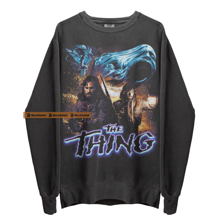 Gray sweatshirt with ’The Thing’ graphic.