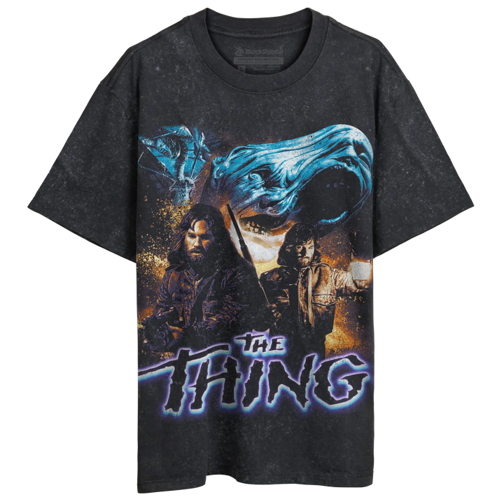 Dark gray short-sleeved t-shirt with a graphic print featuring characters and creatures from ’The Thing’ movie.