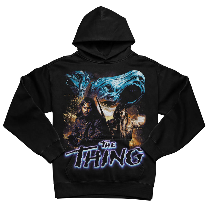 Black hooded sweatshirt with ’the thing’ graphic design featuring a blue creature and two characters.