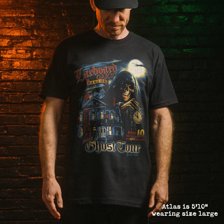 Male model wearing black premium tee with ghost tour graphic 