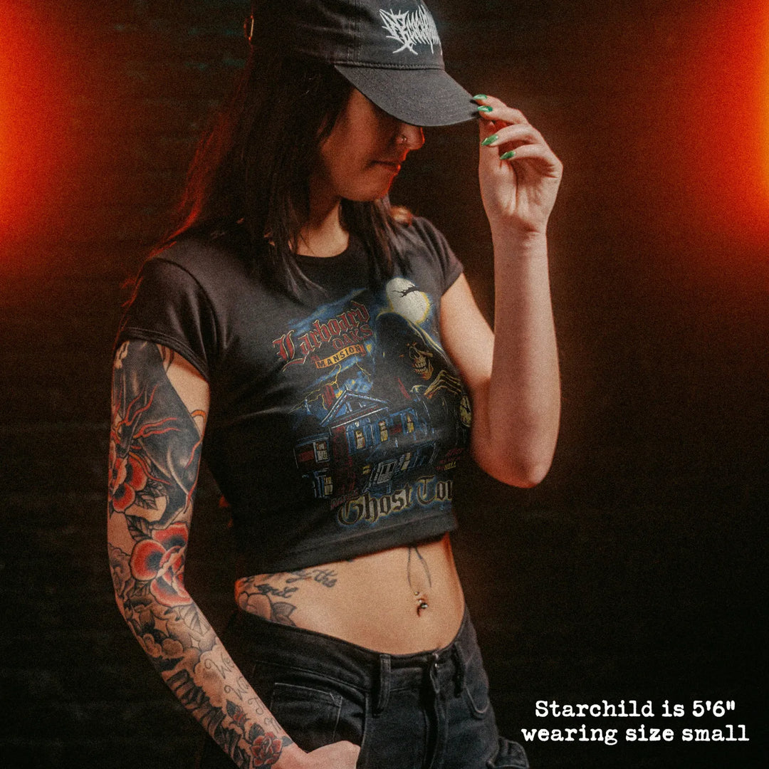 Female model wearing cropped baby tee with larboard oaks ghost tour graphic
