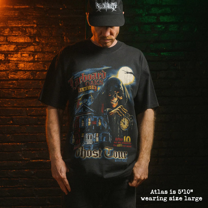 Model wearing heavy tee with ghost tour graphic 