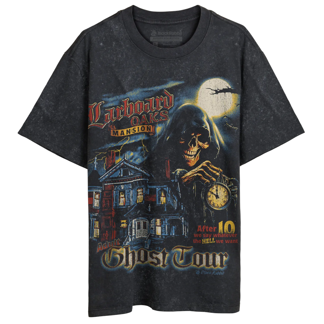 A black, short-sleeved t-shirt with a spooky, vintage-style graphic featuring a haunted mansion, a grim reaper, and a full moon.