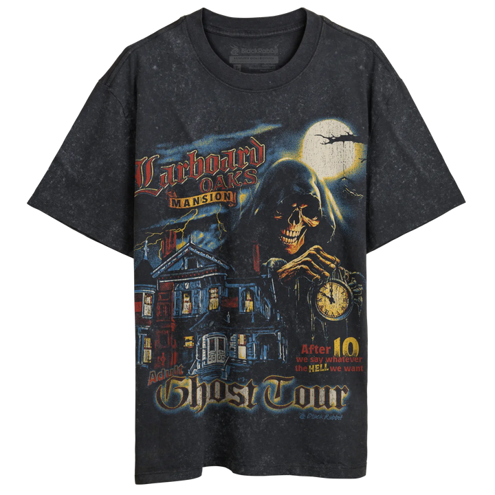 A black, short-sleeved t-shirt with a spooky, vintage-style graphic featuring a haunted mansion, a grim reaper, and a full moon.