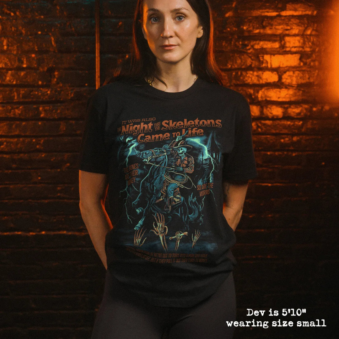 model wear soft premium tee with skeleton song graphic
