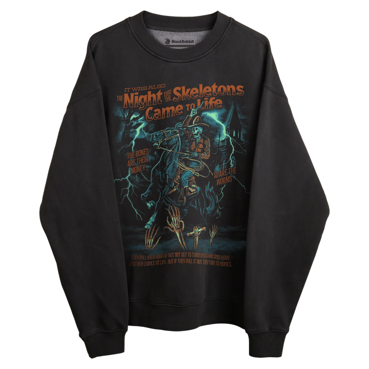 Black crewneck sweatshirt with skeleton design and lightning bolts, inspired by ’the night of skeletons came to life’ movie poster.