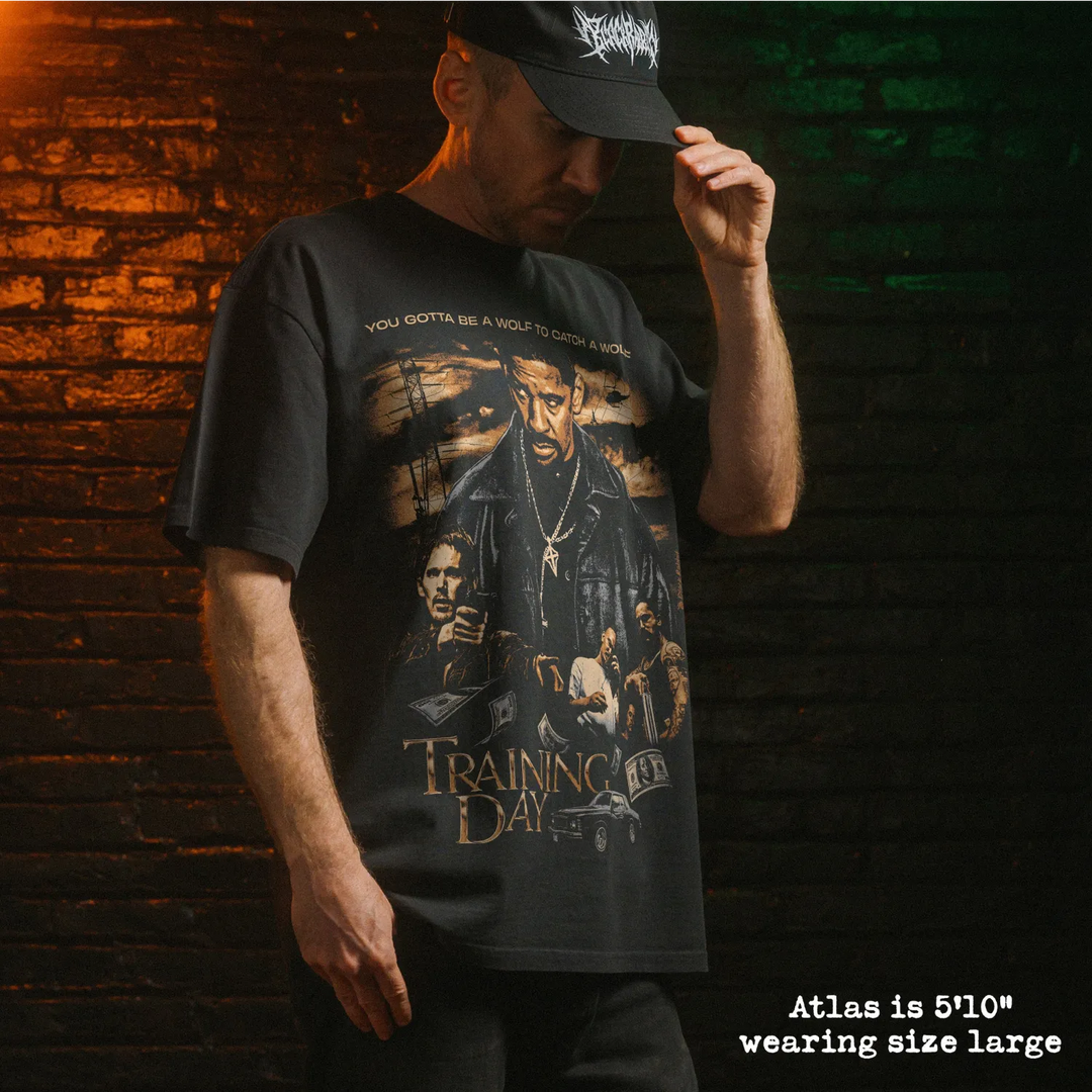 Model wearing heavy tee with training day graphic 