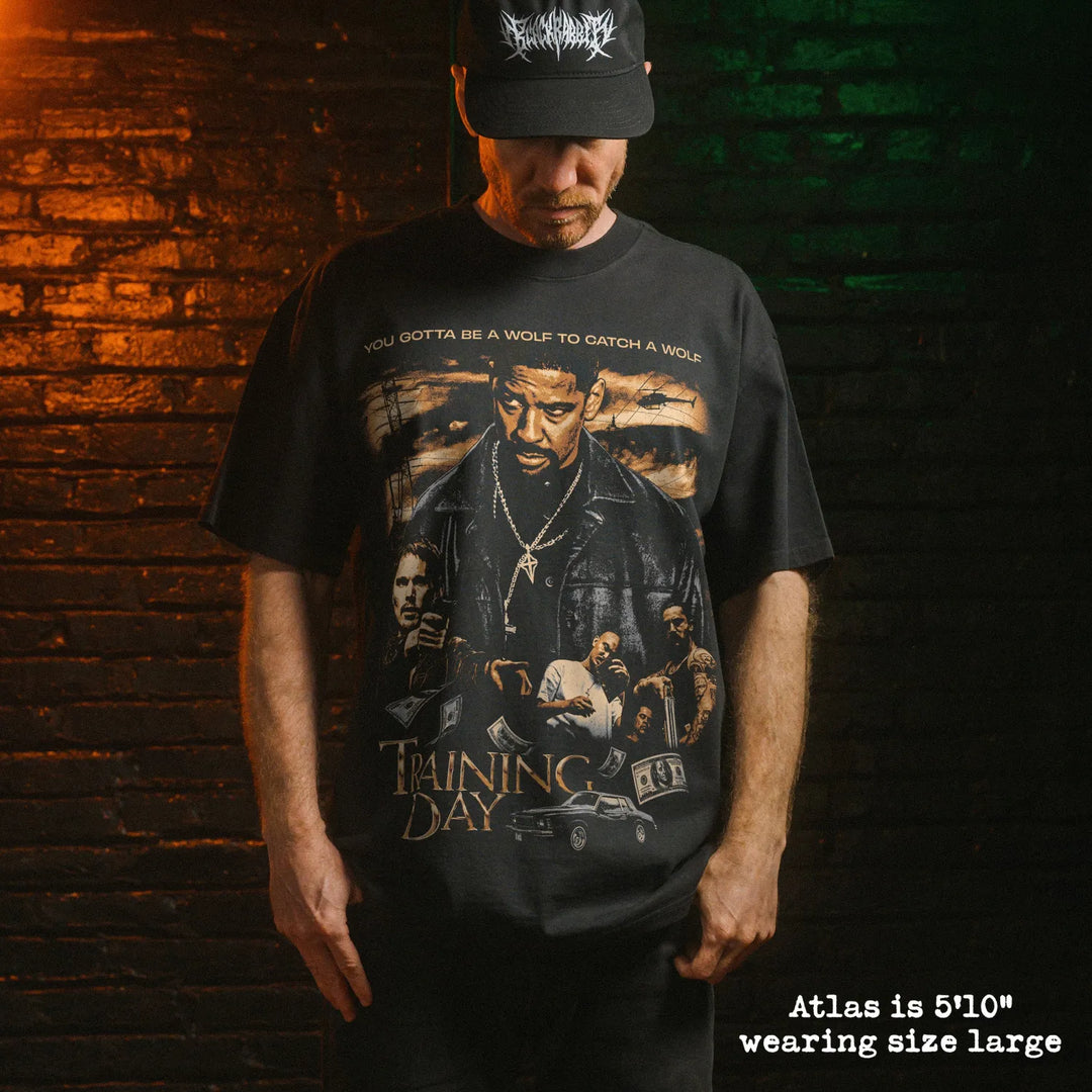 Model wearing heavy tee with training day graphic 