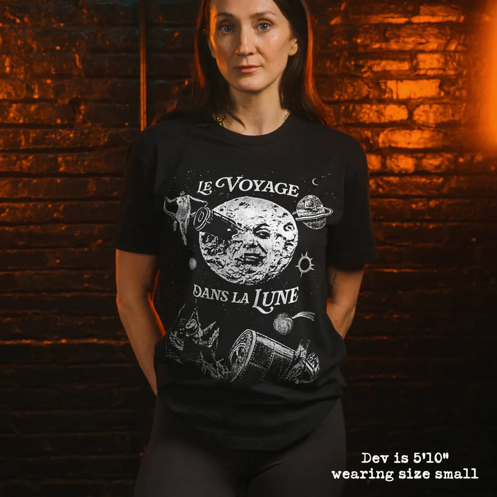 Model wearing black premium tee with a trip to the moon graphic 