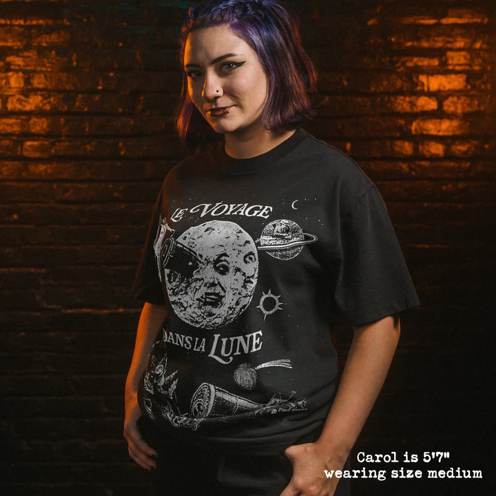 Model wearing heavy tee with A Trip to the Moon graphic 