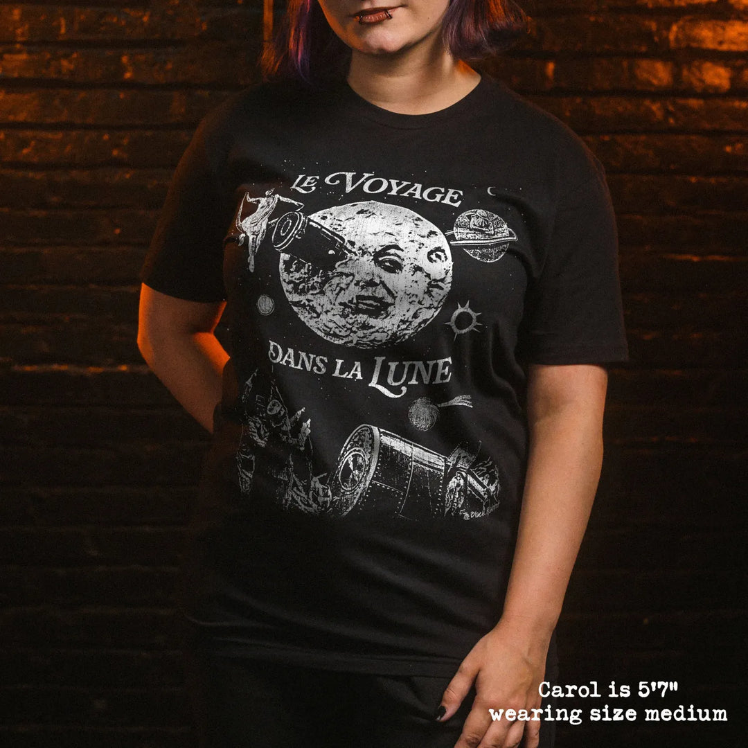 Model wearing black premium tee with a trip to the moon graphic 