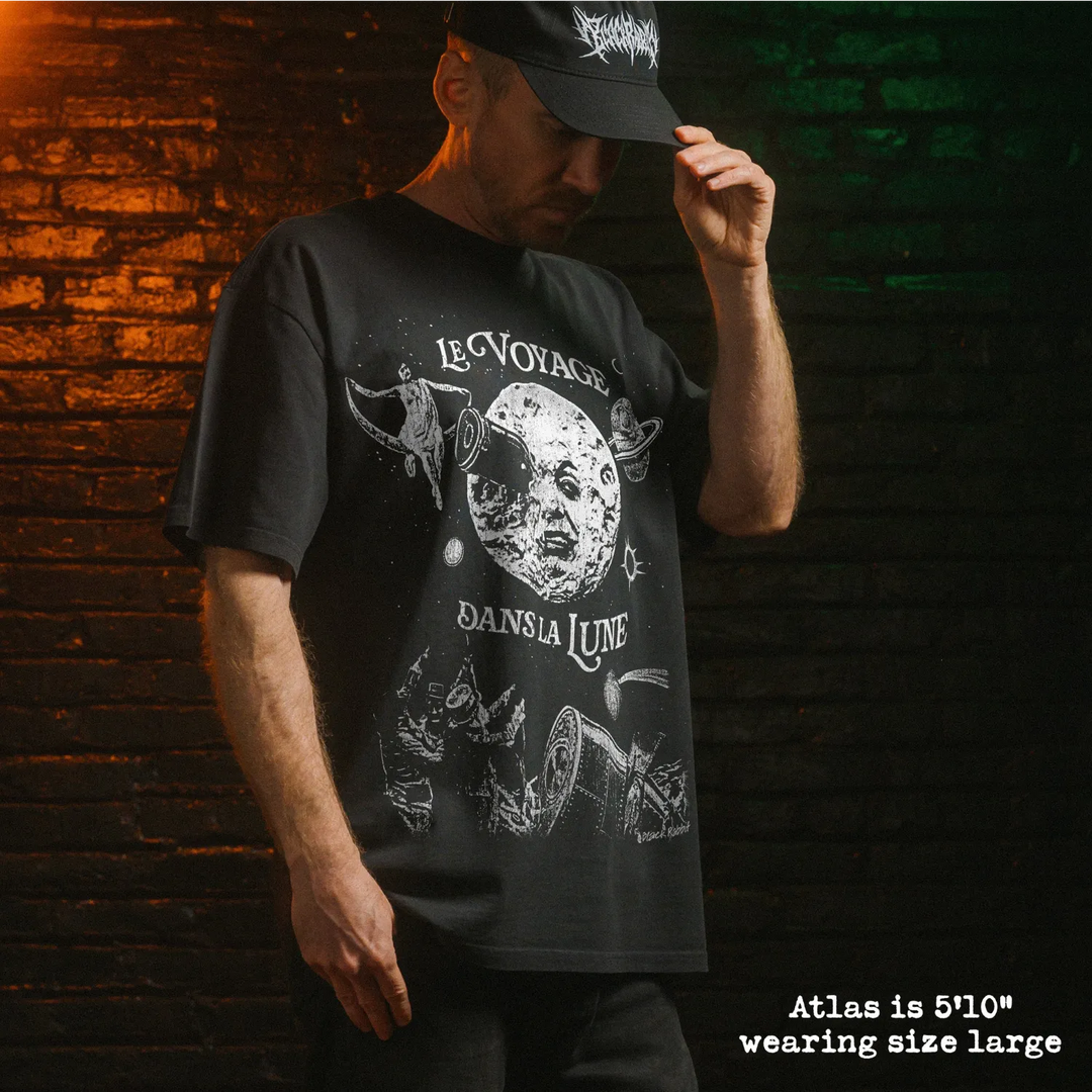 Model wearing heavy tee with a trip to the moon graphic 