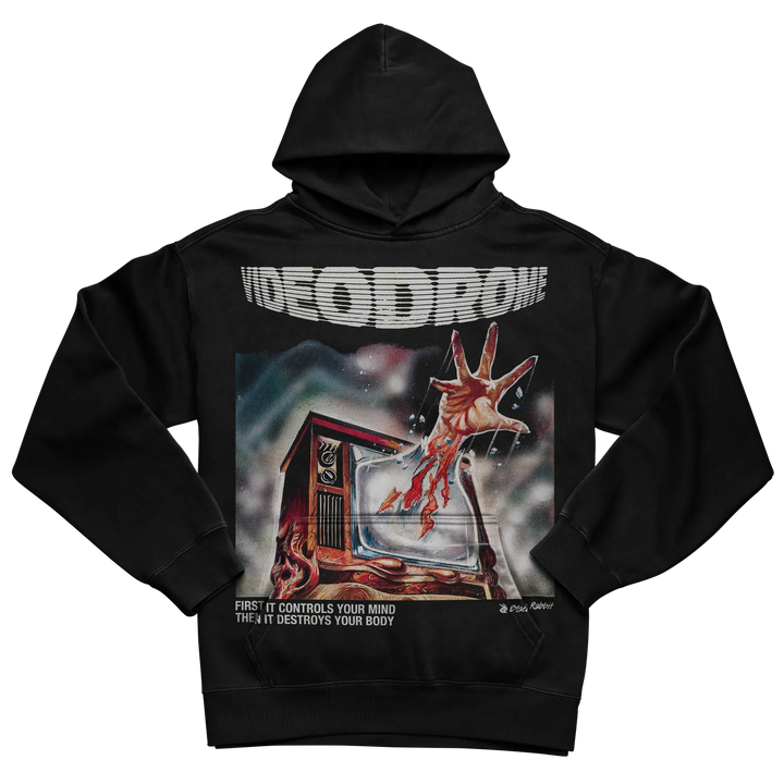 Black hoodie with graphic design of a horror scene featuring a tv and alien creature, material appears to be cotton or polyester blend. 