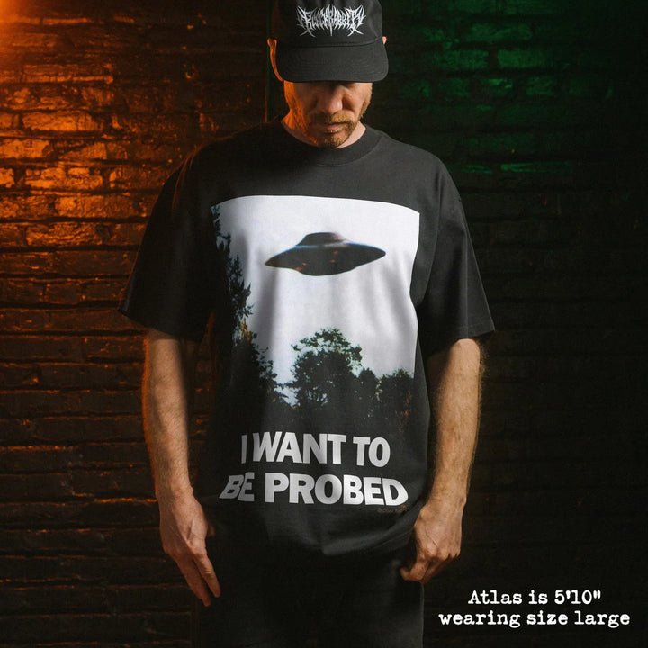 Model wearing heavy tee with probed graphic 