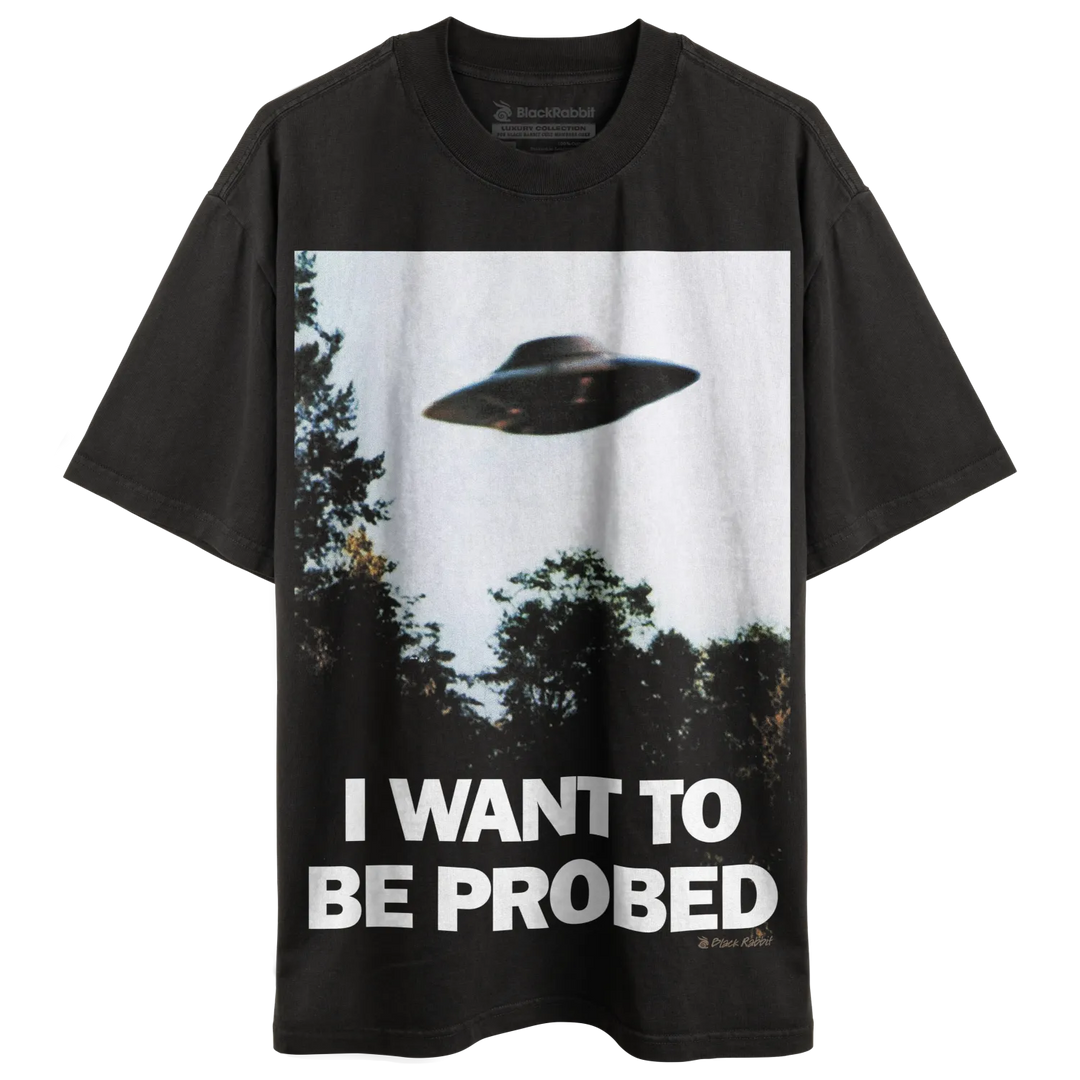 Black t-shirt with ufo graphic and text ’i want to be probed’ in white.