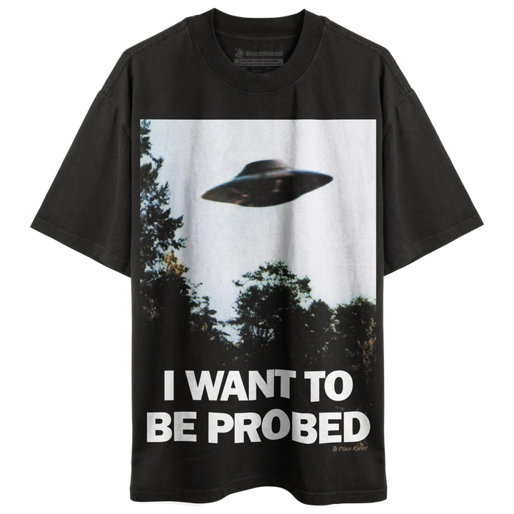 Black t-shirt with ufo graphic and text ’i want to be probed’ in white.