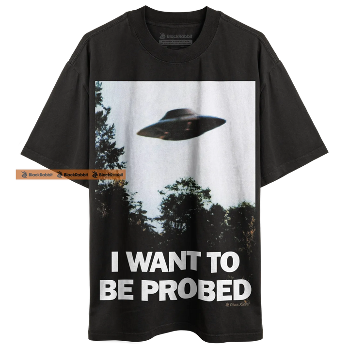 Black t-shirt with UFO graphic.