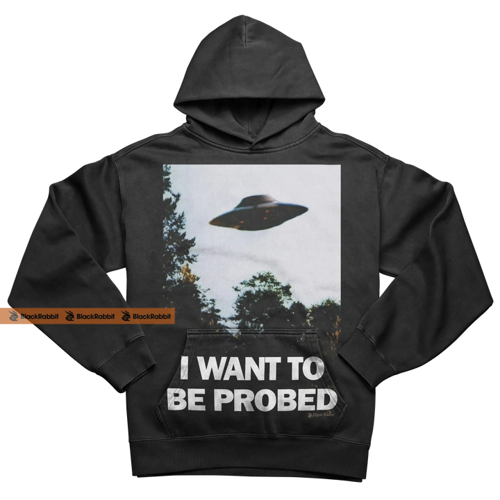 Black hoodie with UFO graphic.