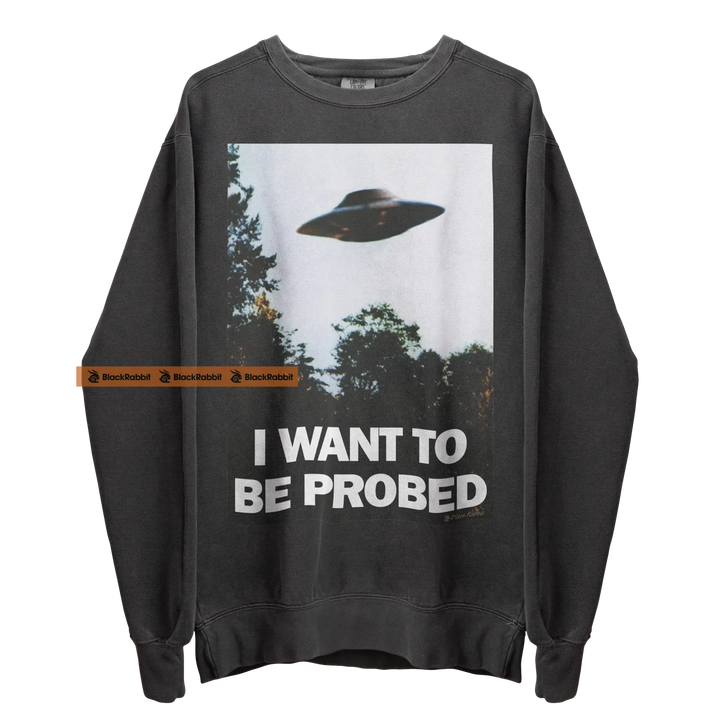 Gray sweatshirt with UFO graphic.