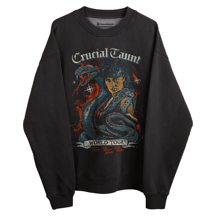 Black sweatshirt with ’crucial taunt world tour’ graphic design featuring a woman and snake, rockabilia brand.