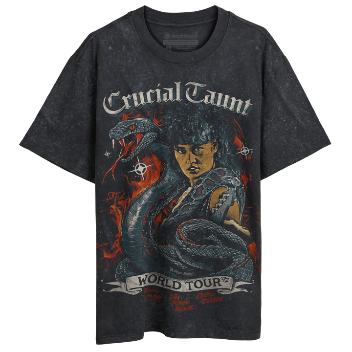 Washed black graphic t-shirt featuring a fierce woman with a snake, ’Crucial Taunt World Tour ’92’’ text.